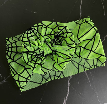 GREEN MESH WITH BLACK SPIDER WEBS